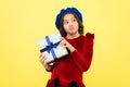 Time to shop. thoughtful small girl with present box. small girl hold holiday gift. happy birthday. boxing day. parisian