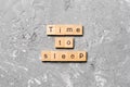 Time to sleep word written on wood block. time to sleep text on cement table for your desing, concept Royalty Free Stock Photo