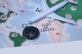 Time to Travel. Idea for tourism with airplane, compass and map on a light background. Concept on the theme of flights. Royalty Free Stock Photo