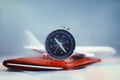 Time to Travel. Idea for tourism with an airplane, passport and tickets, compass and map on a light background. Concept Royalty Free Stock Photo