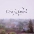 Time to travel lettering on blurred nature background