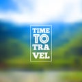 Time to travel lettering on blurred nature background