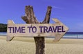Time to Travel wooden sign with a beach on background Royalty Free Stock Photo