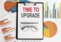 Time to Update . Conceptual background with chart ,papers, pen and glasses, business Royalty Free Stock Photo