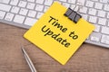 Time to update text on adhesive note Royalty Free Stock Photo