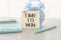 TIME TO WIN. Text on white sheet of notepad Royalty Free Stock Photo
