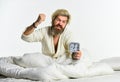 Time to work. Annoying ringing alarm clock. Break discipline regime. time to wake up. early morning routine. bearded man Royalty Free Stock Photo