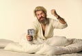 Time to work. Annoying ringing alarm clock. Break discipline regime. time to wake up. early morning routine. bearded man Royalty Free Stock Photo