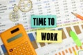 TIME to WORK. text on white paper on gray background Royalty Free Stock Photo
