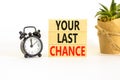 Time to your last chance symbol. Concept words Your last chance on wooden blocks on a beautiful white table white background. Royalty Free Stock Photo