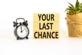 Time to your last chance symbol. Concept words Your last chance on wooden blocks on a beautiful white table white background. Royalty Free Stock Photo