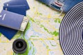 Time for travelling. Necessary accessories for summer trips map, jeans, camera lens, money and international passport Royalty Free Stock Photo