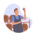 Time for vinification. Male character holds glass of red wine and assesses its quality Royalty Free Stock Photo