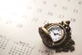 Time for Waiting with Vintage Pocket Watch on the Calendar and s Royalty Free Stock Photo