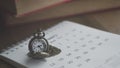 Time for Waiting with Vintage Pocket Watch on the Calendar and W Royalty Free Stock Photo