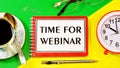 The time of the webinar Ã¢â¬â the inscription text of the work plans in a notebook.