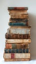 Time-worn books stacked with history in their pages. A collection of literature showcasing the beauty of age. Concept of Royalty Free Stock Photo