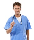 Time for your shot. Studio portrait of a young doctor holding a syringe up to the camera.