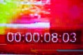 Timecode on the abstract glitch background Royalty Free Stock Photo