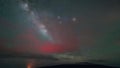 Timelapse of brighty milky way galaxy and stars with clouds movings, seen from high mountain, sunrise