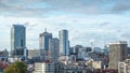 Timelapse of a business and economical center, with modern buildings or towers.