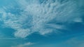 Flying Moving White Clouds In A Blue Sky. Blue Sky Background With Many Layers Tiny Clouds. Royalty Free Stock Photo