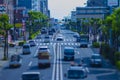 A timelapse of miniature traffic jam at the avenue daytime in the downtown tiltshift Royalty Free Stock Photo