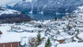 Timelapse, Panoramic view on a town in the mountains covered with snow. Morschach, Lake Lucerne, Canton Schwyz, Switzerland