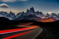 Timelapse shot of car lights in Fitz Roy Mountains in Argentina Royalty Free Stock Photo