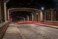 Timelapse shot of car lights in a tunnel in Pavia, Italy