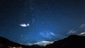 Timelapse stars and moon in mountain night sky. Moonrise