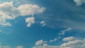 Summer Blue Sky. Bright Sun Light Ray Flare And Sunbeam Shining. B Roll Blue Sky And Gray Clouds Moving In Opposite Royalty Free Stock Photo