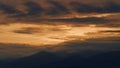 Sunrise Clouds With Mountains. The Sun Rises Above The Mountains. Sky Texture. Royalty Free Stock Photo