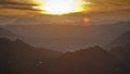 Timelapse of the sunrise over the silhouettes of the mountains. Andreev.