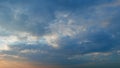 Sunset or dawn backlit by warm sun. Panorama style background. Sunset or dawn sky. Timelapse.