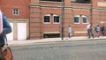 4K timelapse shoppers in Leeds city walking down a highstreet during daylight