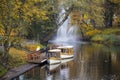 Timelapse of the tourist boats Autumn park in the center of Riga with fountai, Latvia Canal that flows through Bastion park autumn