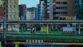 A timelapse of traffic jam at Iidabashi station in Tokyo daytime long shot tilt