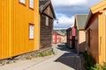 The timeless allure of Roros is captured here with its wooden houses bearing the classic Scandinavian palette