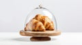 Timeless Artistry: A Croissant Under A Glass Dome