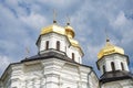 The timeless beauty of the gilded domes of an ancient Orthodox church is showcased in this image as they rise majestically against Royalty Free Stock Photo