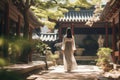 Timeless Elegance: Hanbok-Clad Woman in Ancient Temple Courtyard