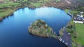 Gougane Barra, County Cork, Ireland, where water flows gracefully around a historic chapel