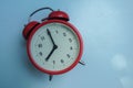 timeliness concept of red round clock at 8 o`clock