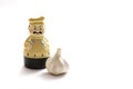 Timer in the form of a cook and a head of garlic on a white background. Royalty Free Stock Photo
