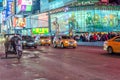 Times Square in New York City Manhattan at Night. Traffic on the Road and Toys R Us Store in Background Royalty Free Stock Photo