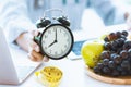 Times to Healthcare or Diet Food advisor show clock for timing care your health concept Royalty Free Stock Photo