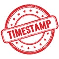 TIMESTAMP text on red grungy round rubber stamp