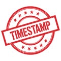 TIMESTAMP text written on red vintage round stamp