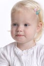 Timid blond toddler girl